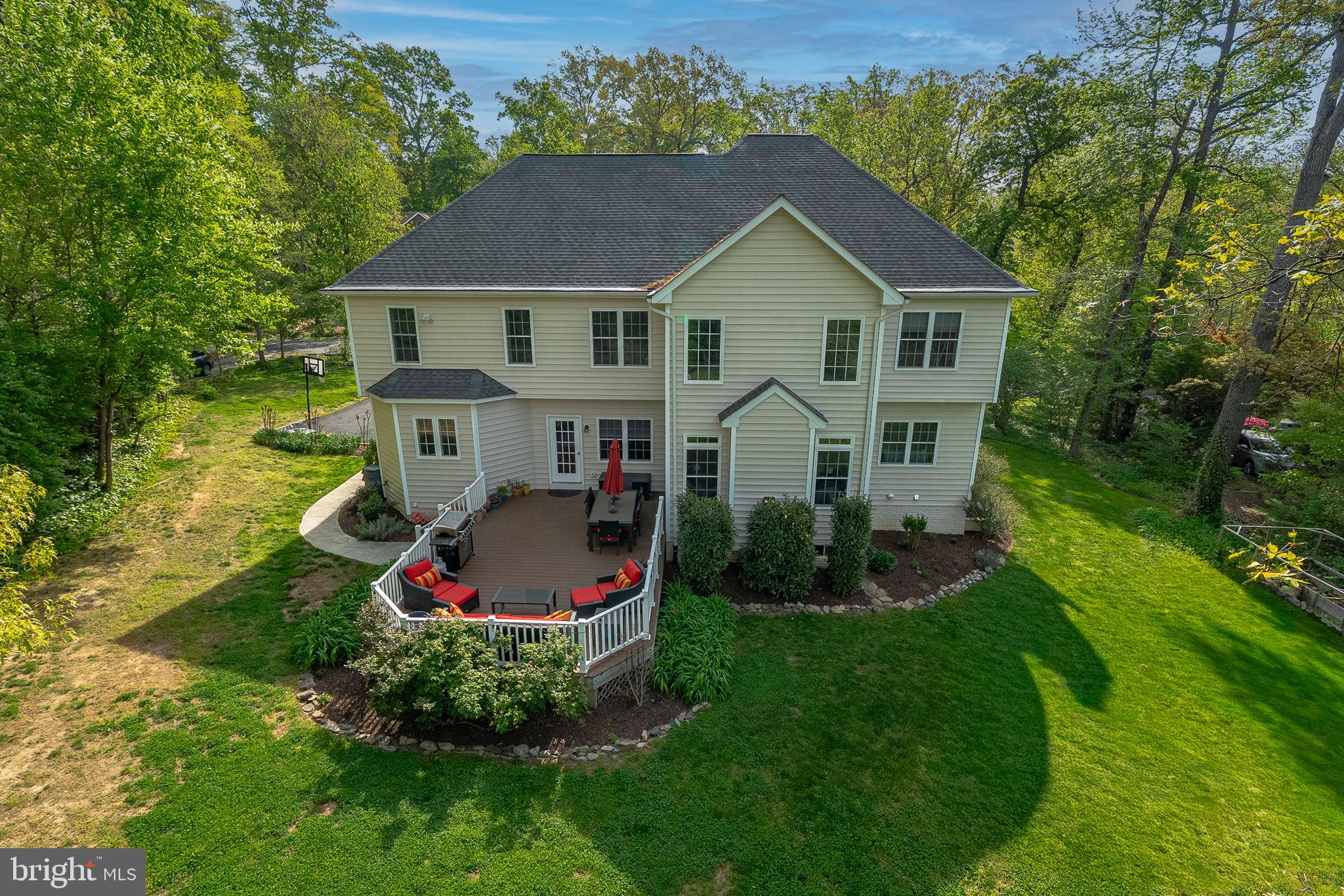 1232 Shenandoah Road Alexandria, VA 22308 - Photo 47 of 50 a front view of a house with a yard and garage