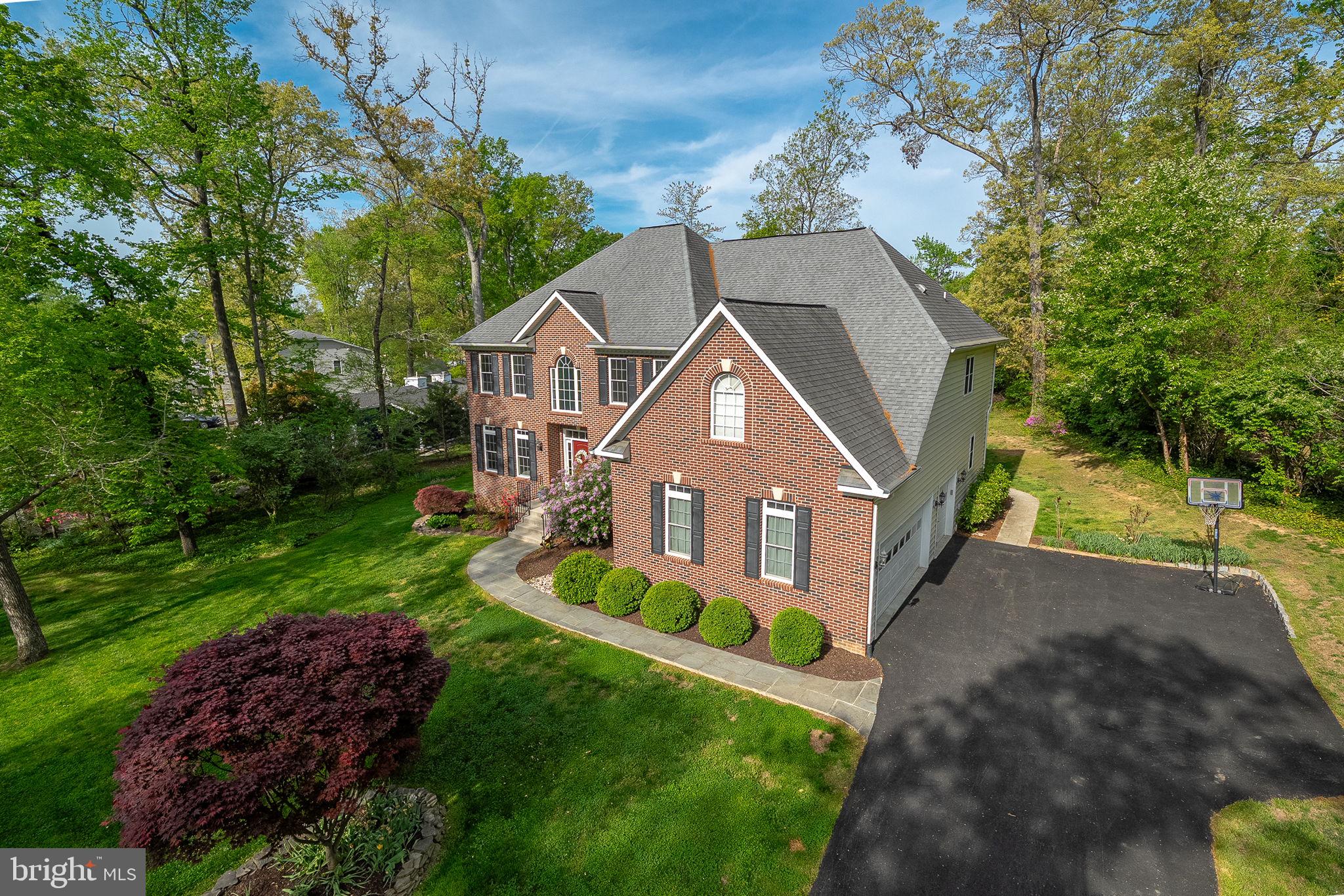 1232 Shenandoah Road Alexandria, VA 22308 - Photo 50 of 50 a aerial view of a house with a big yard plants and large trees