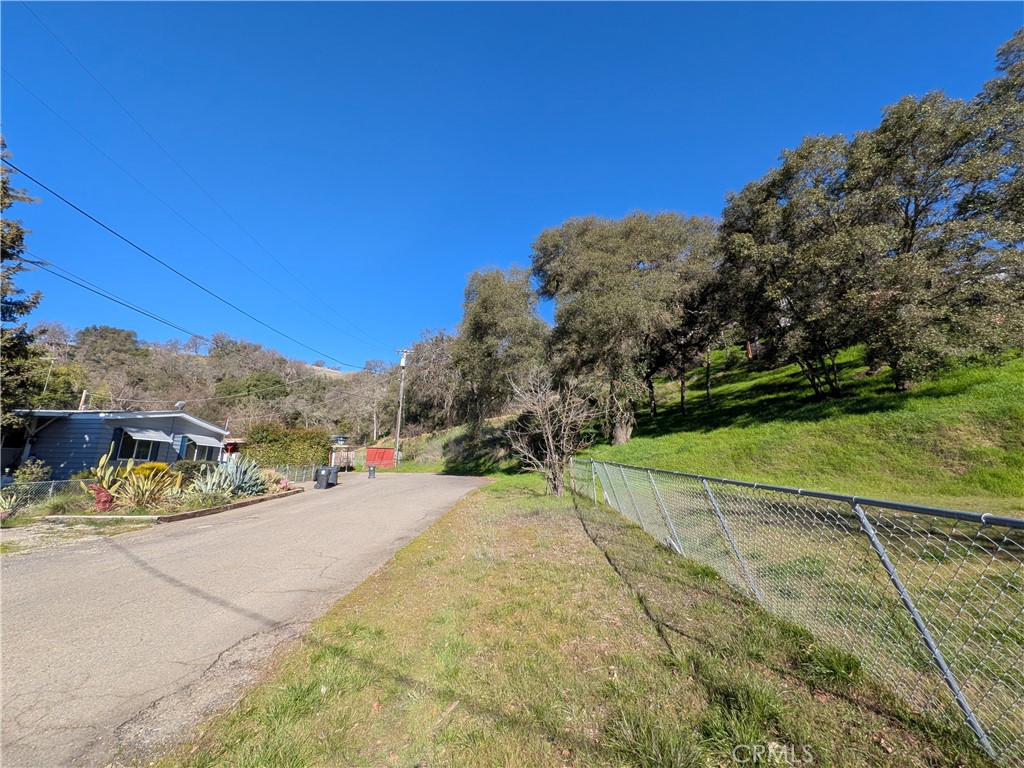 5857 Roland Drive Lucerne, CA 95458 - Photo 11 of 11 a view of a road with a yard