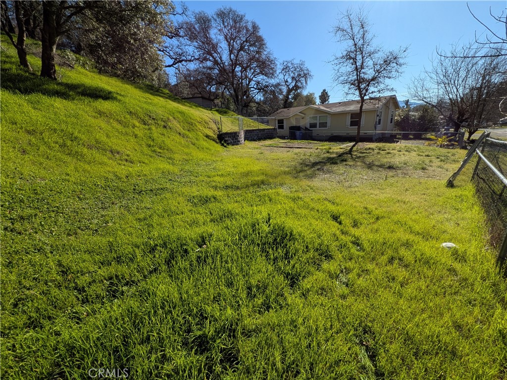 5857 Roland Drive Lucerne, CA 95458 - Photo 6 of 11 a view of a swimming pool with an outdoor space and seating area