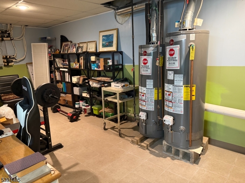 27 Passaic Avenue, Unit 2 Nutley, NJ 07110 - Photo 11 of 18 a view of a room with gym equipment