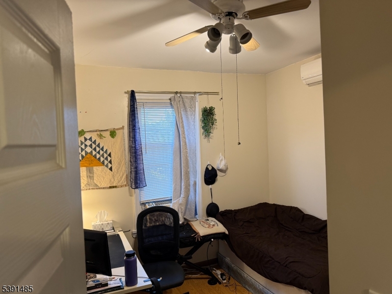 27 Passaic Avenue, Unit 2 Nutley, NJ 07110 - Photo 13 of 18 a view of workspace with mirror