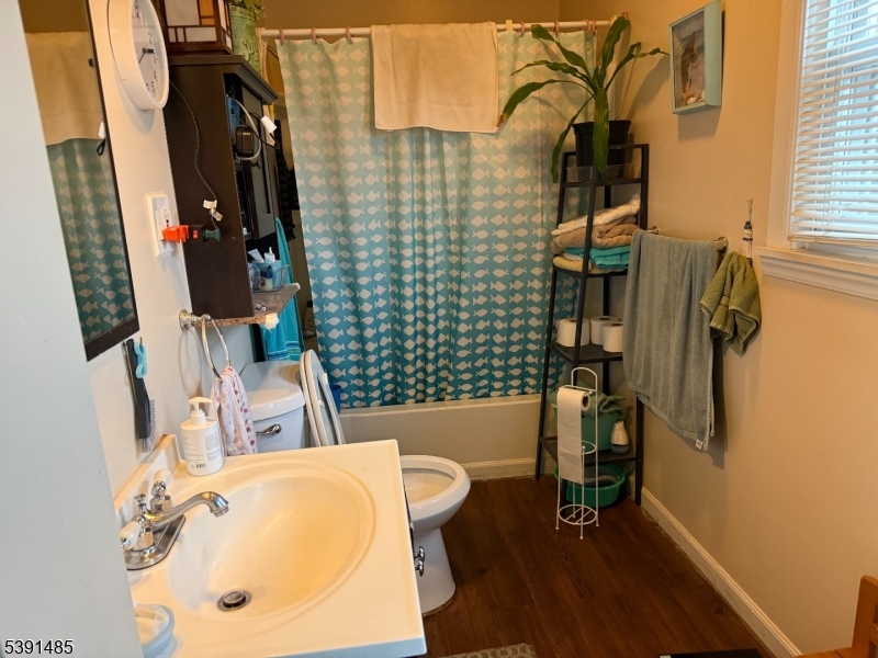 27 Passaic Avenue, Unit 2 Nutley, NJ 07110 - Photo 18 of 18 a bathroom with a sink toilet and shower