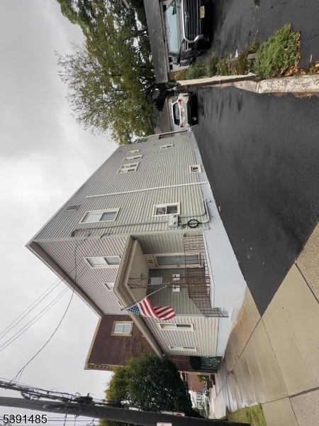 27 Passaic Avenue, Unit 2 Nutley, NJ 07110 - Photo 9 of 18 an aerial view of a house