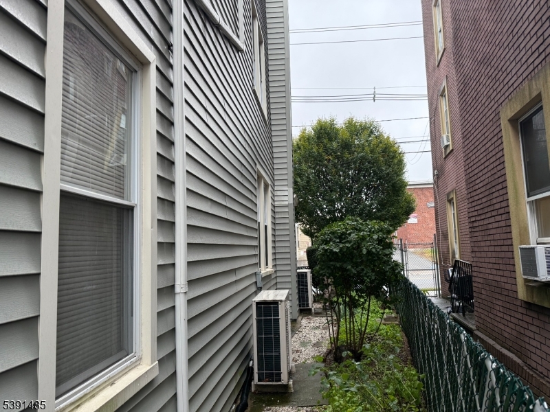 27 Passaic Avenue, Unit 2 Nutley, NJ 07110 - Photo 10 of 18 a backyard of a house