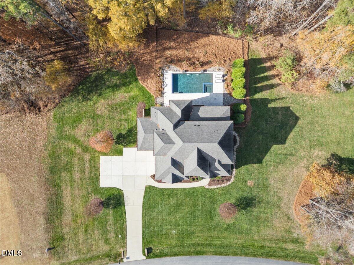 325 Forest Bridge Road Youngsville, NC 27596 - Photo 7 of 99 an aerial view of a house with garden space and street view