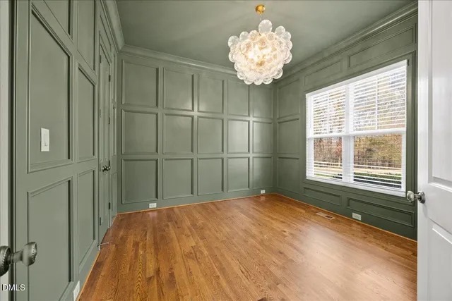 a living room with fireplace furniture and a fireplace