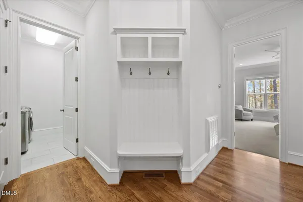 a bathroom with a toilet a sink and shower
