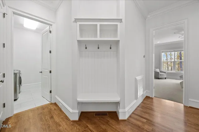 a bathroom with a toilet a sink and shower