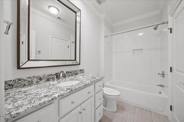 a room with furniture and air hockey table