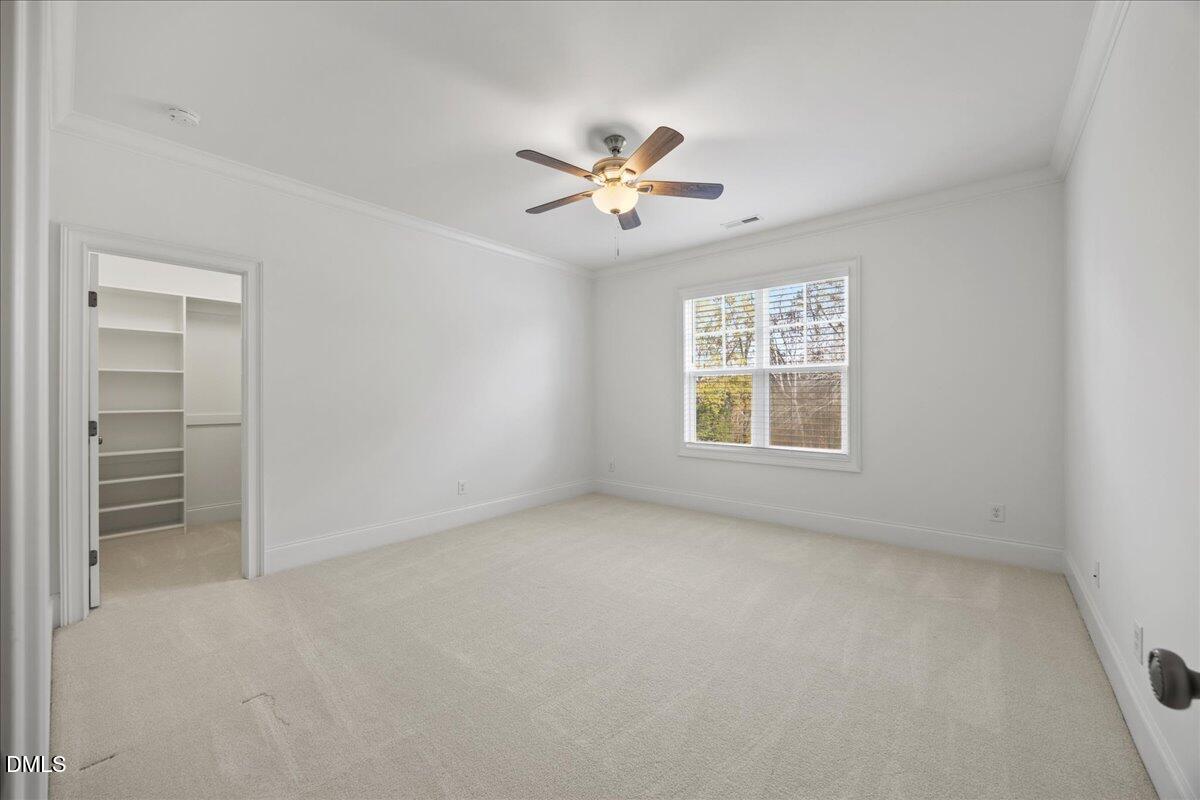 325 Forest Bridge Road Youngsville, NC 27596 - Photo 38 of 99 a view of an empty room with a window