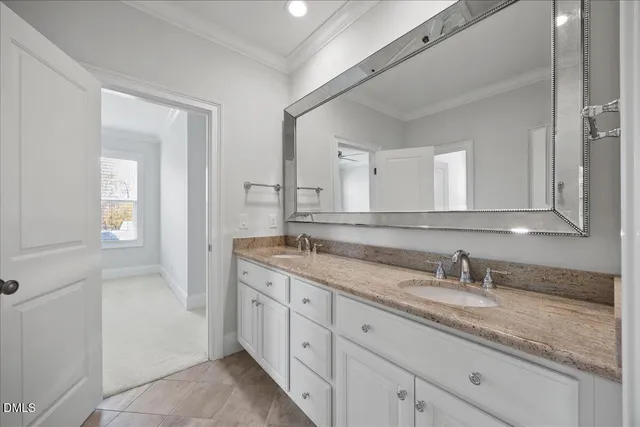 a view of a room with wooden floor and windows