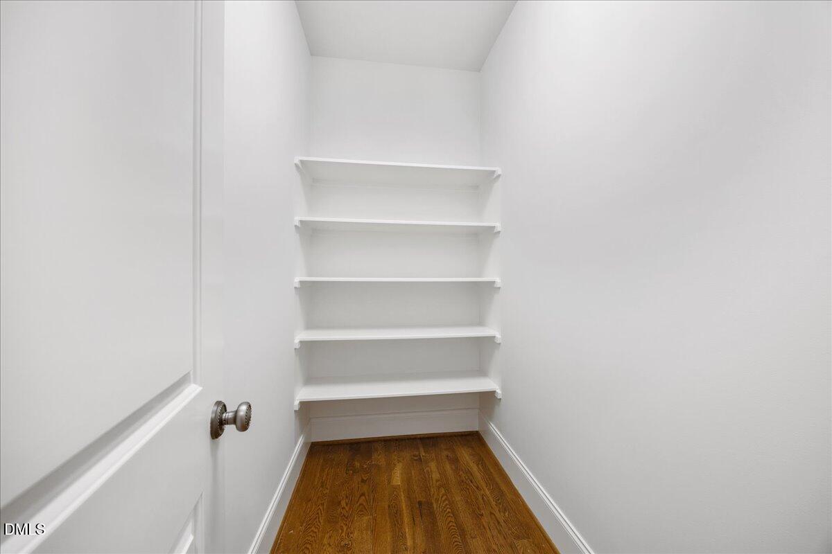 325 Forest Bridge Road Youngsville, NC 27596 - Photo 46 of 99 a view of a room with shelf