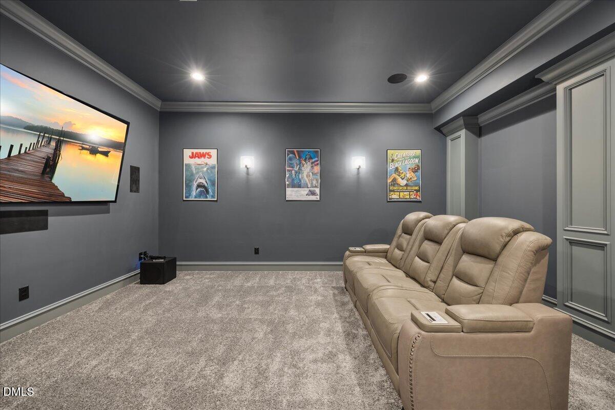 325 Forest Bridge Road Youngsville, NC 27596 - Photo 49 of 99 a room with furniture and a flat screen tv