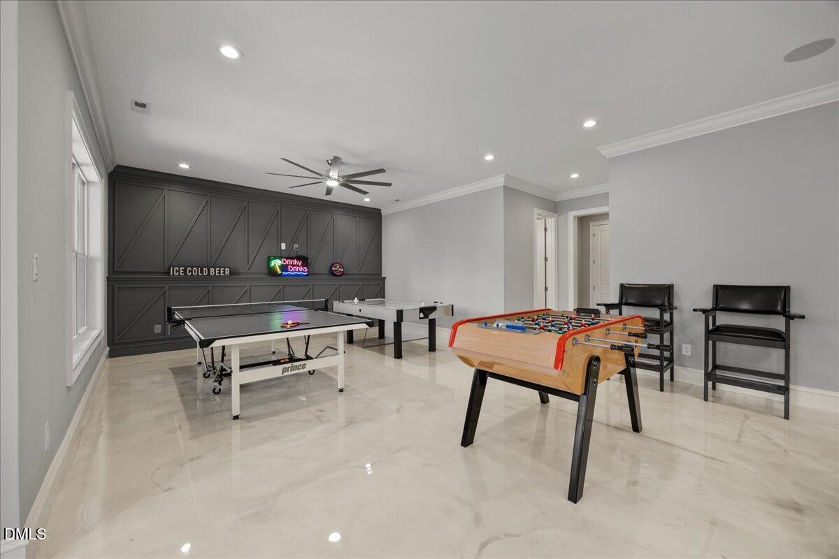 325 Forest Bridge Road Youngsville, NC 27596 - Photo 52 of 99 a room with furniture and air hockey table