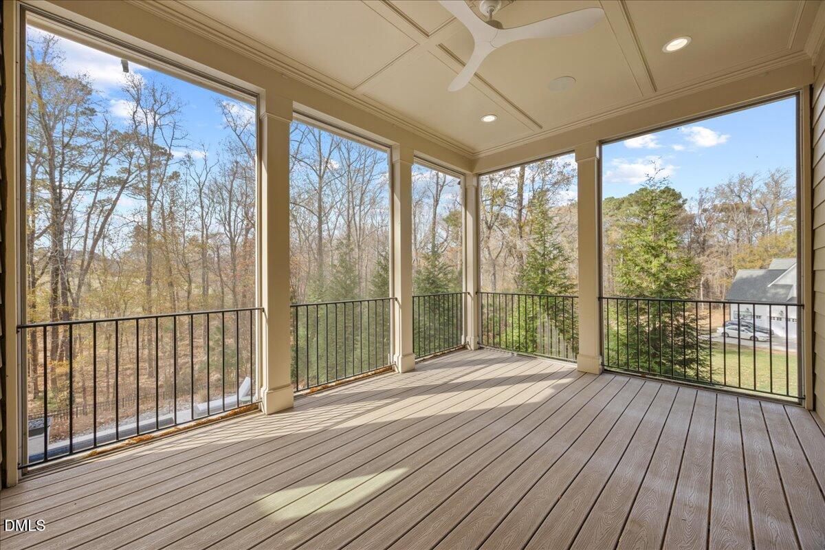 325 Forest Bridge Road Youngsville, NC 27596 - Photo 62 of 99 a view of a room with wooden floor and balcony