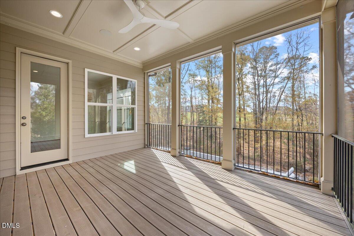 325 Forest Bridge Road Youngsville, NC 27596 - Photo 63 of 99 a view of a room with wooden floor and windows
