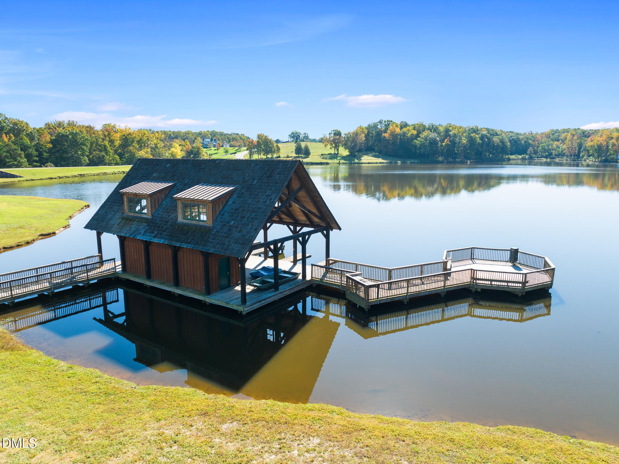 325 Forest Bridge Road Youngsville, NC 27596 - Photo 79 of 99 a view of a lake with a ocean view