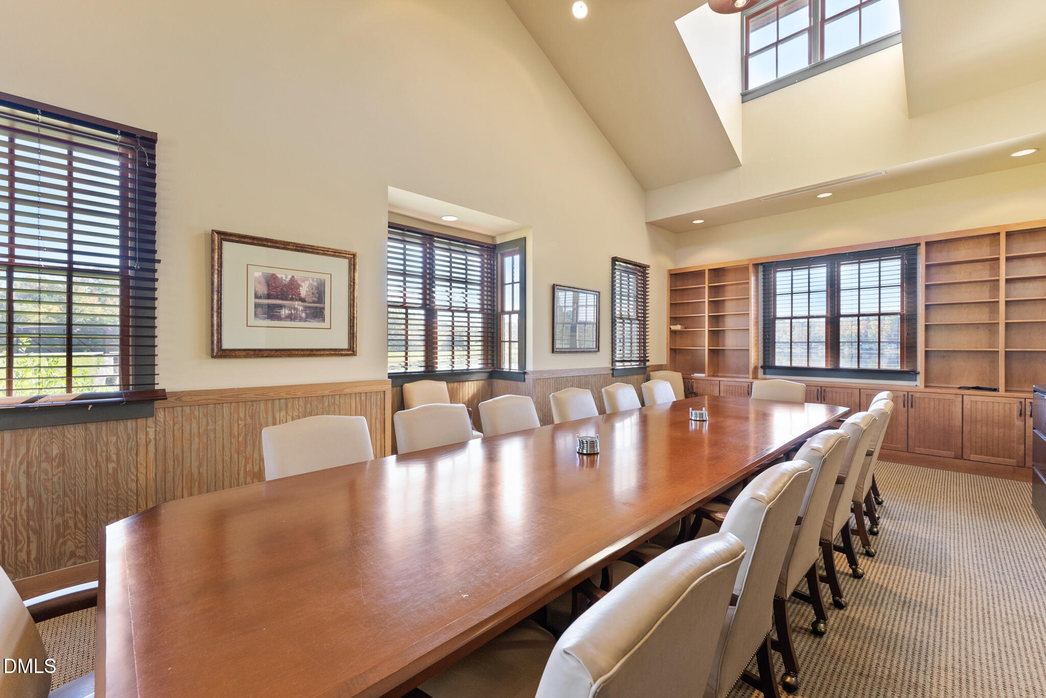 325 Forest Bridge Road Youngsville, NC 27596 - Photo 91 of 99 a view of a dining room with furniture and wooden floor