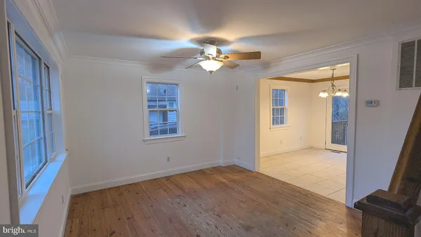a view of entryway with wooden floor