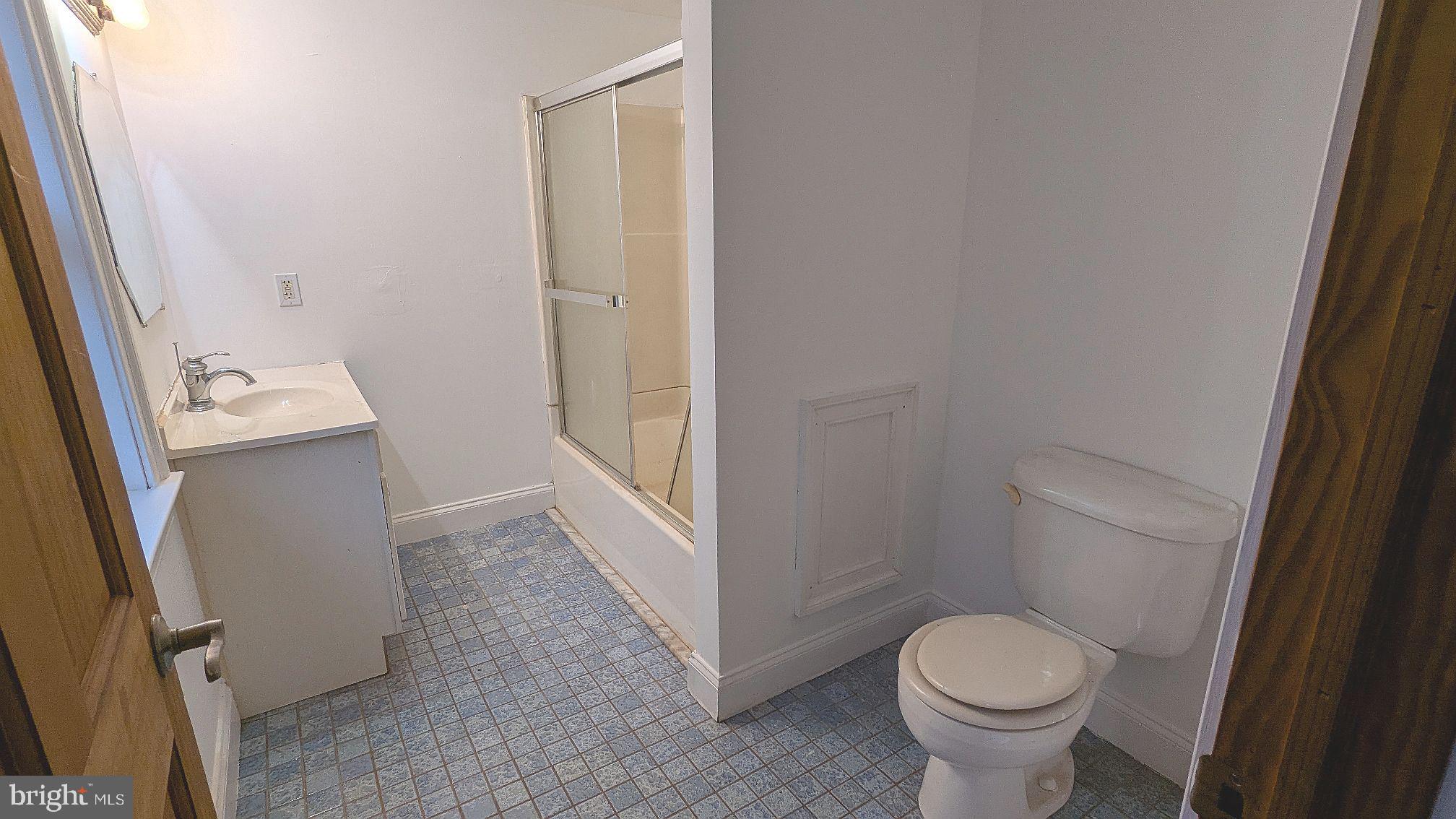 21 Sycamore Road Pennsville, NJ 08070 - Photo 19 of 31 a bathroom with a sink and toilet