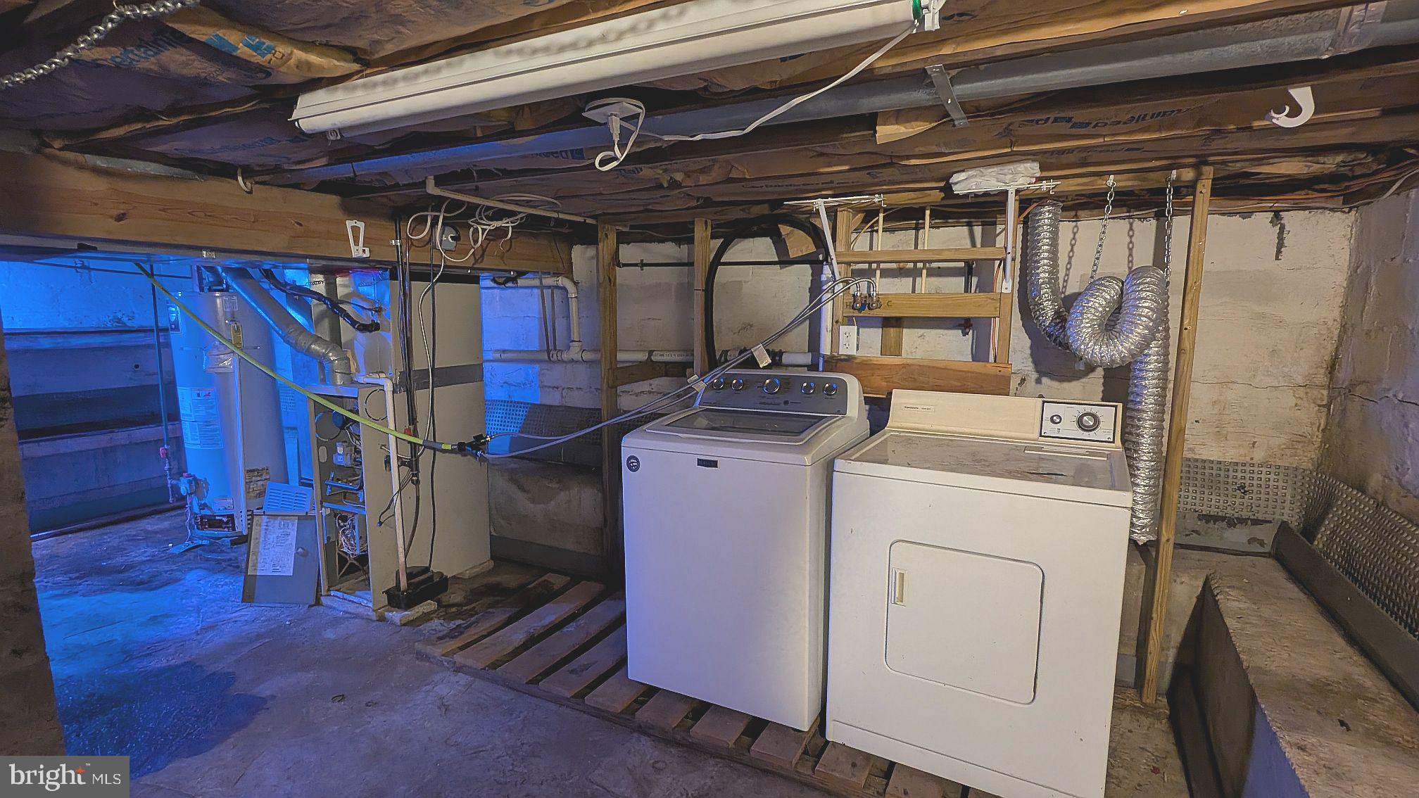 21 Sycamore Road Pennsville, NJ 08070 - Photo 26 of 31 a utility room with dryer and washer