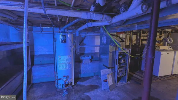 a view of house with a yard