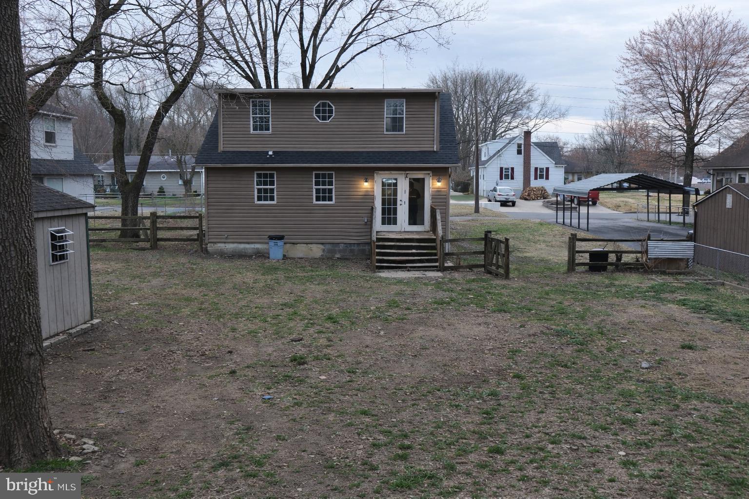 21 Sycamore Road Pennsville, NJ 08070 - Photo 30 of 31 a front view of a house with a yard and garage