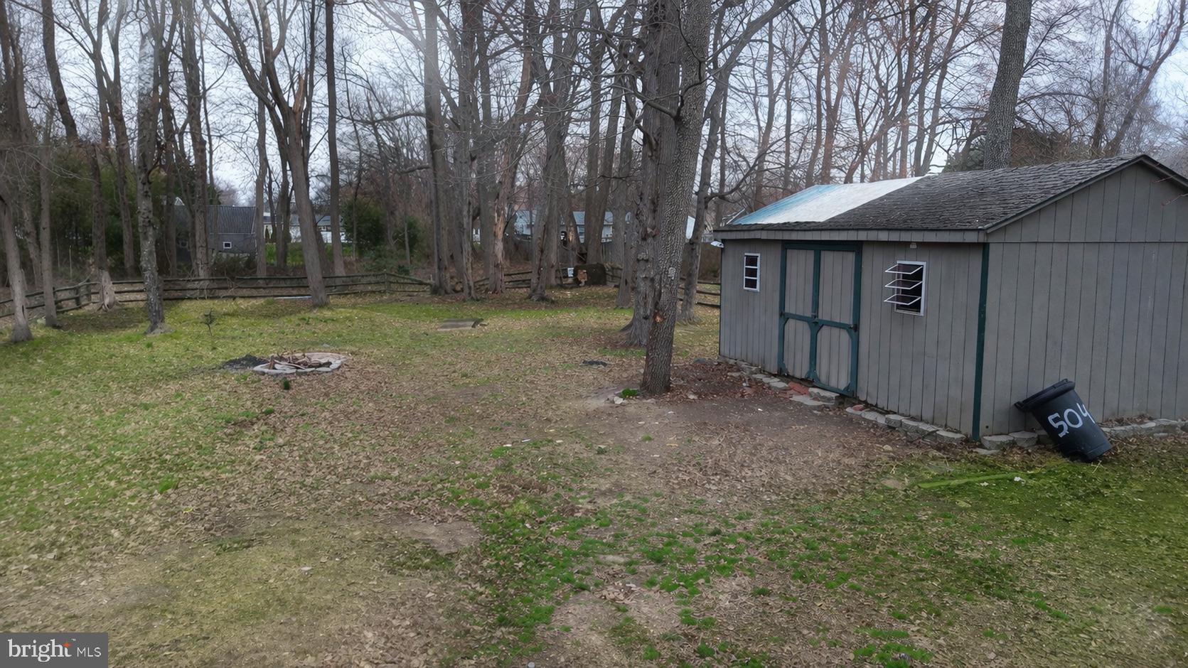 21 Sycamore Road Pennsville, NJ 08070 - Photo 31 of 31 a backyard of a house with lots of green space
