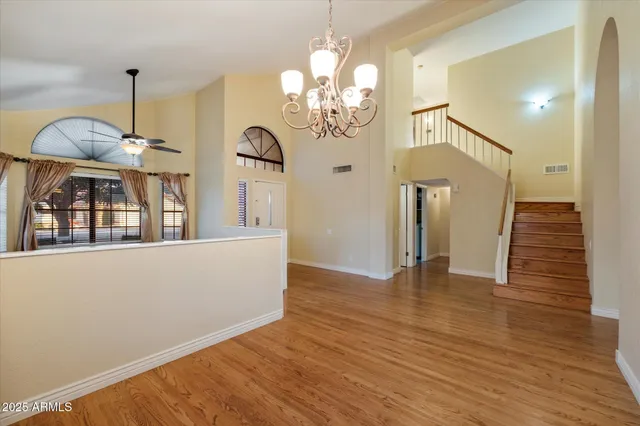 a bathroom with a sink a mirror and a vanity