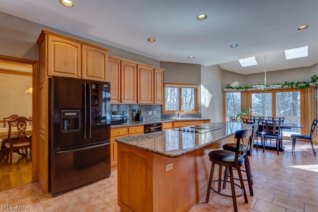5571 High Point Road Solon, OH 44139 - Photo 11 of 34 The kitchen features granite countertops, all appliances and recently installed cooktop