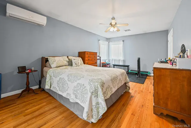 a bed room with a bed and a chandelier