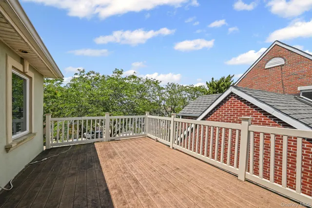 a view of a wooden street from a balcony