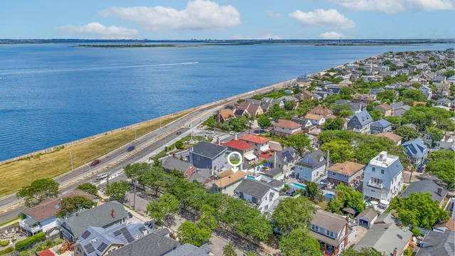 a view of balcony with wooden floor