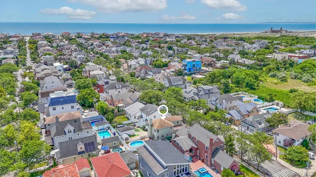 an aerial view of a city with lots of residential buildings