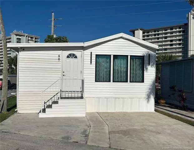 a view of a house with a garage