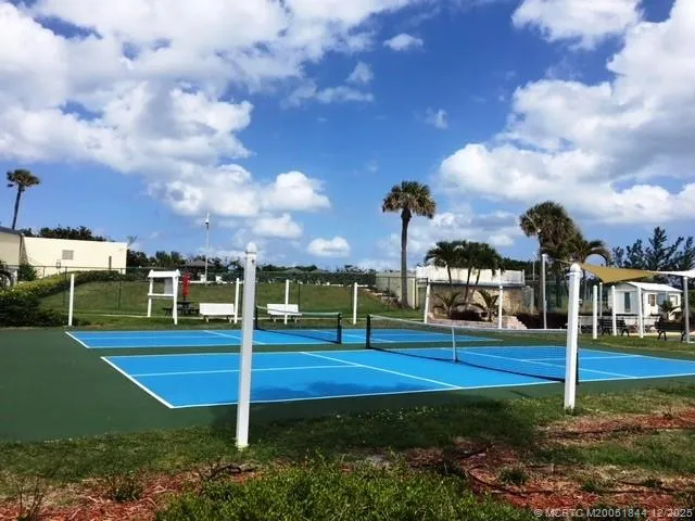 a living room with lots of furniture and lots of furniture