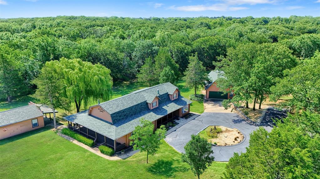 View from above of property with a forest, Lots of Land for Fun and Events