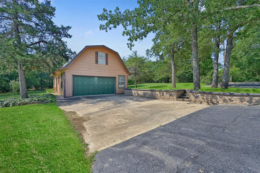 570 Ayres Road Bells, TX 75414 - Photo 36 of 39 Large Shop with Electric and asphalt driveway