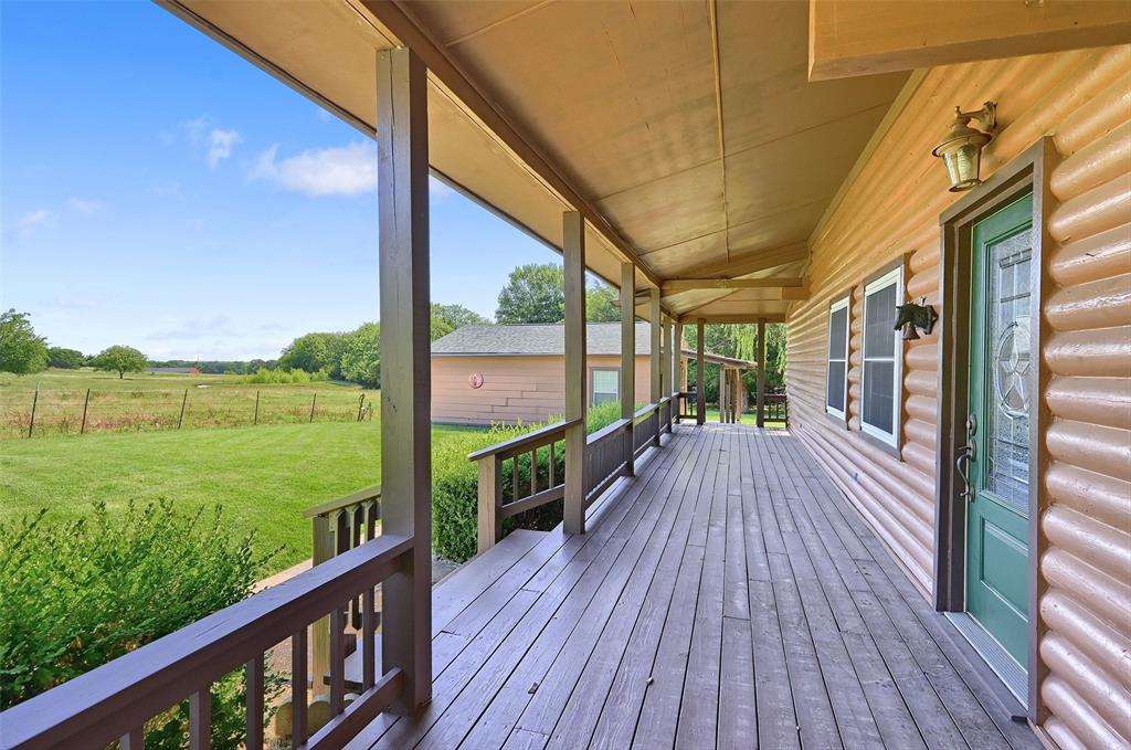570 Ayres Road Bells, TX 75414 - Photo 6 of 39 Porch with a yard and a view of countryside
