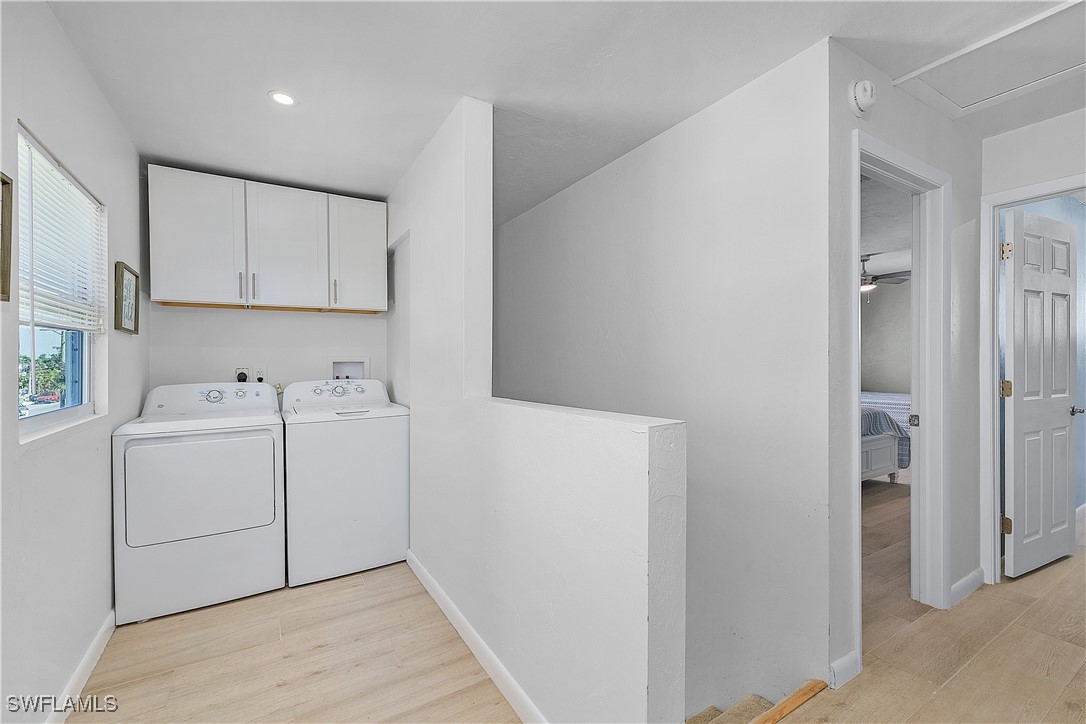 3128 Stringfellow Road St. James City, FL 33956 - Photo 30 of 50 a utility room with dryer and washer