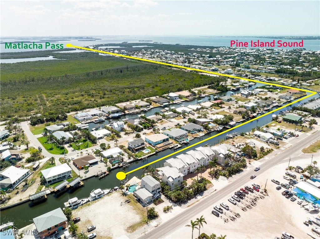 3128 Stringfellow Road St. James City, FL 33956 - Photo 4 of 50 a view of a city