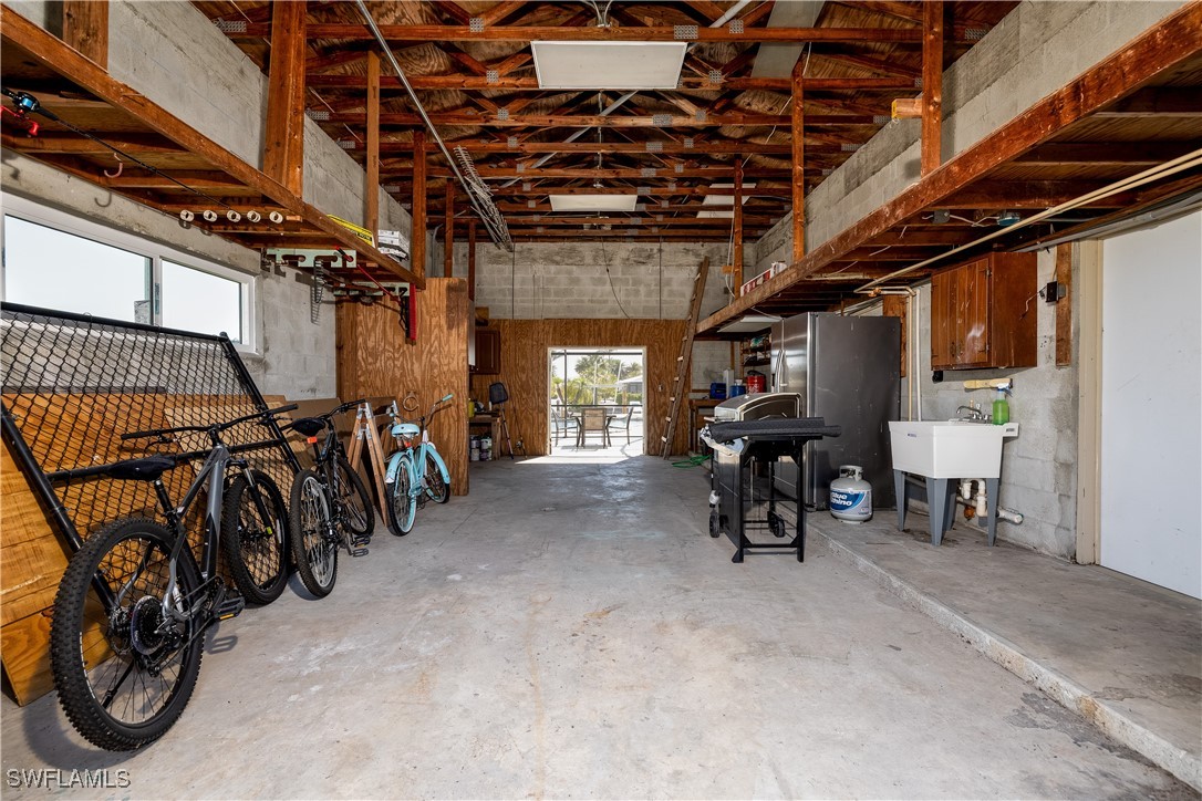 3128 Stringfellow Road St. James City, FL 33956 - Photo 45 of 50 a view of a room with gym equipment