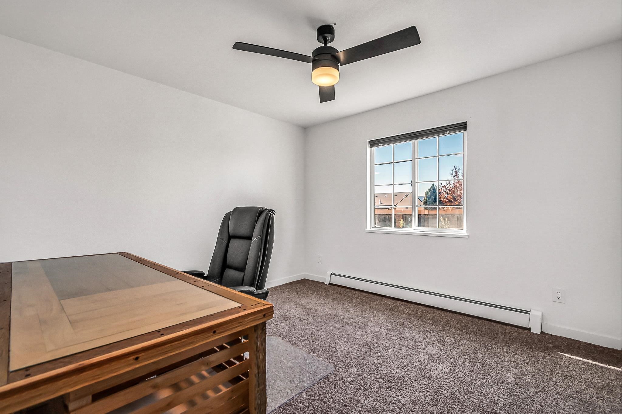505 North Oak Street Fruita, CO 81521 - Photo 11 of 21 a room with storage and utility