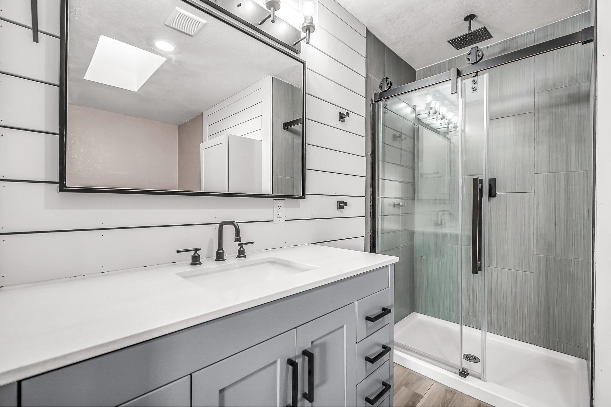 505 North Oak Street Fruita, CO 81521 - Photo 15 of 21 a bathroom with a sink a toilet and shower
