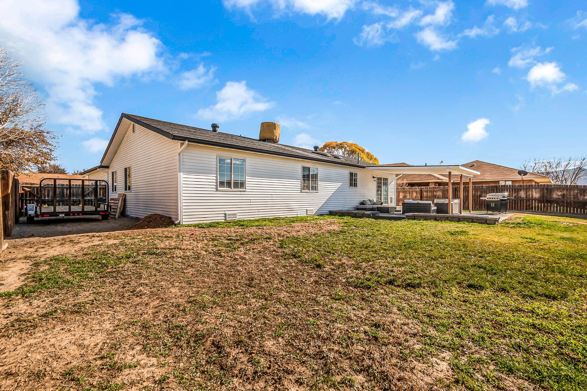 505 North Oak Street Fruita, CO 81521 - Photo 21 of 21 a front view of a house with a garden