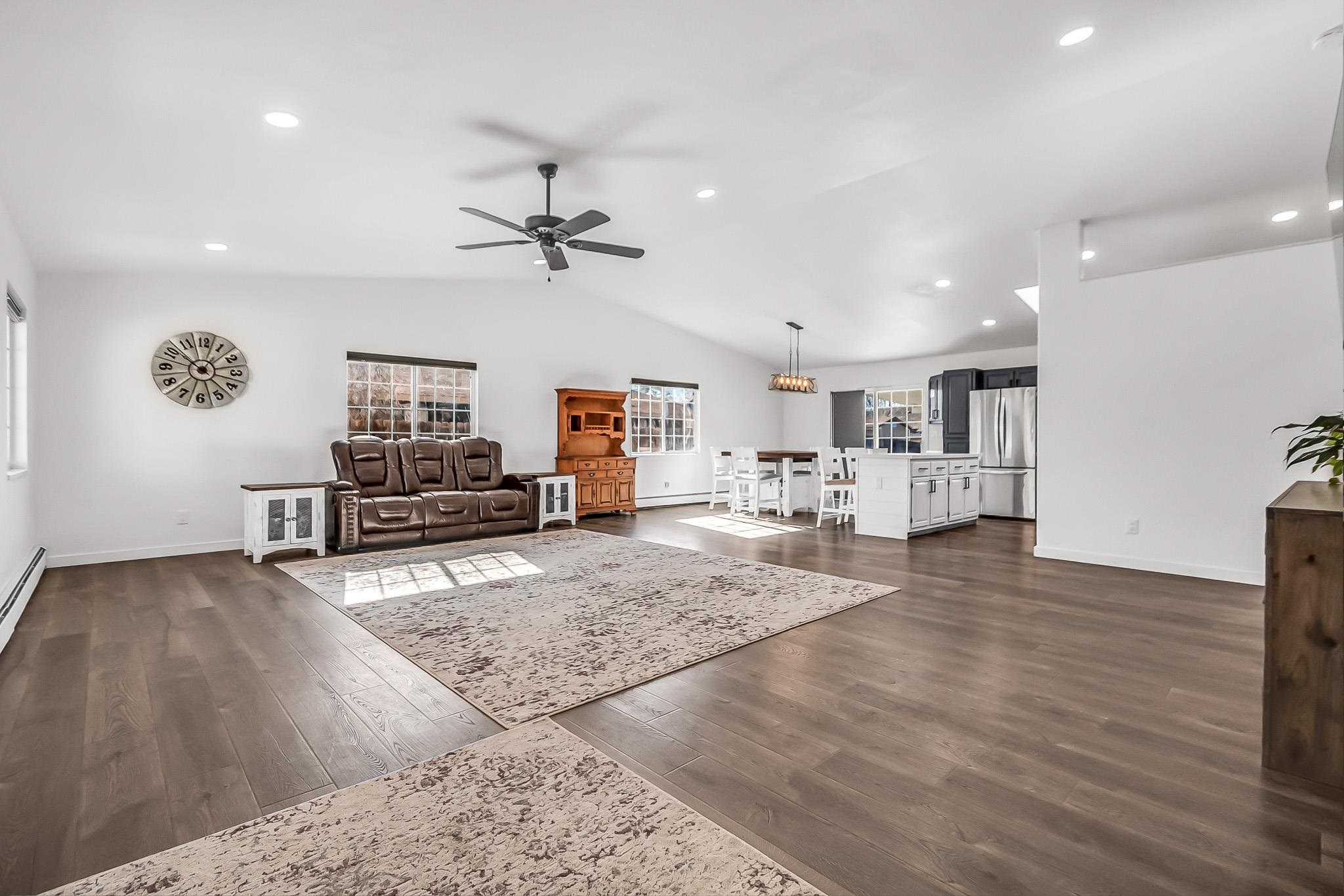 505 North Oak Street Fruita, CO 81521 - Photo 4 of 21 a living room with furniture and a wooden floor