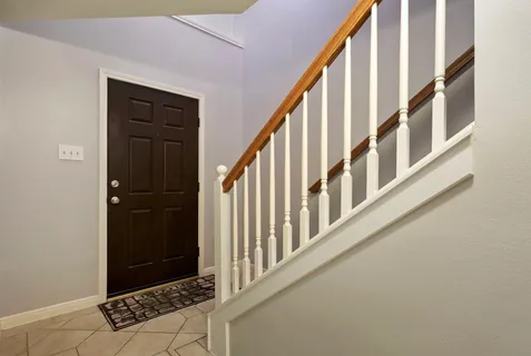 a view of an entryway with staircase