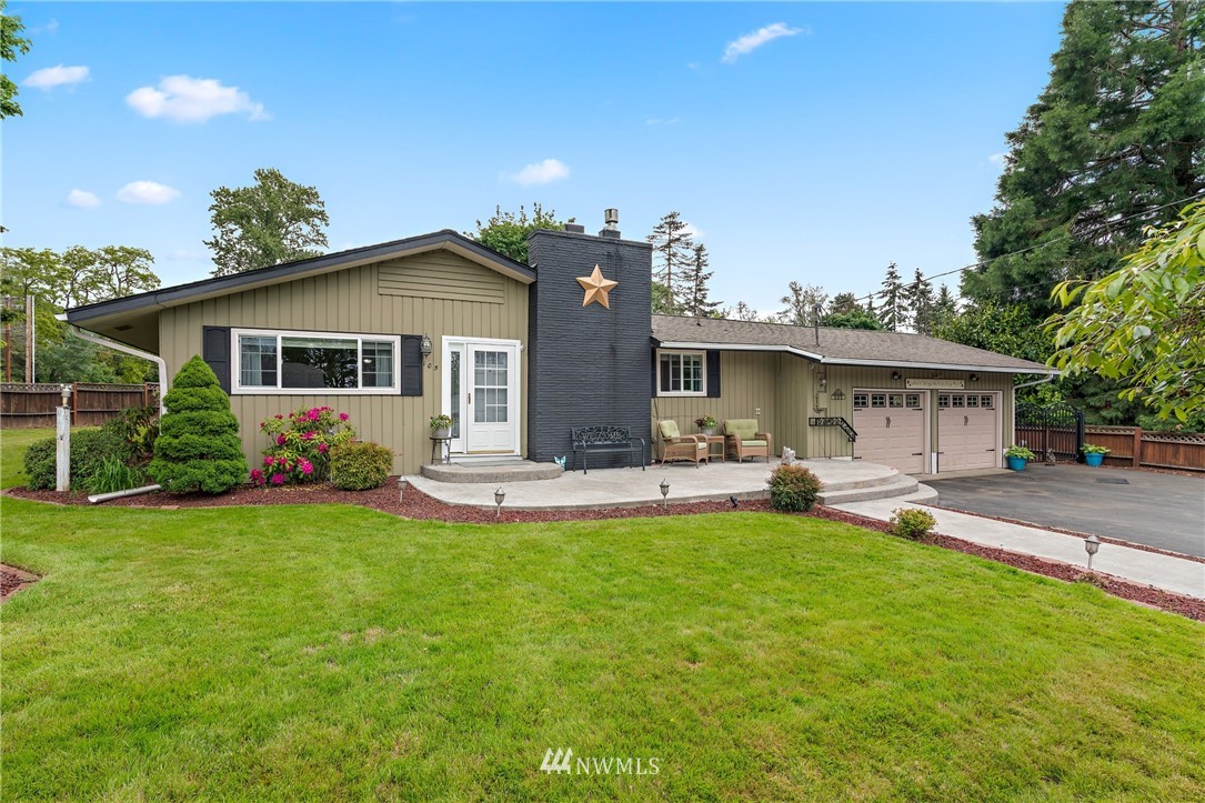 105 Ribelin Road Chehalis, WA 98532 - Photo 1 of 27 a front view of house with yard and seating area