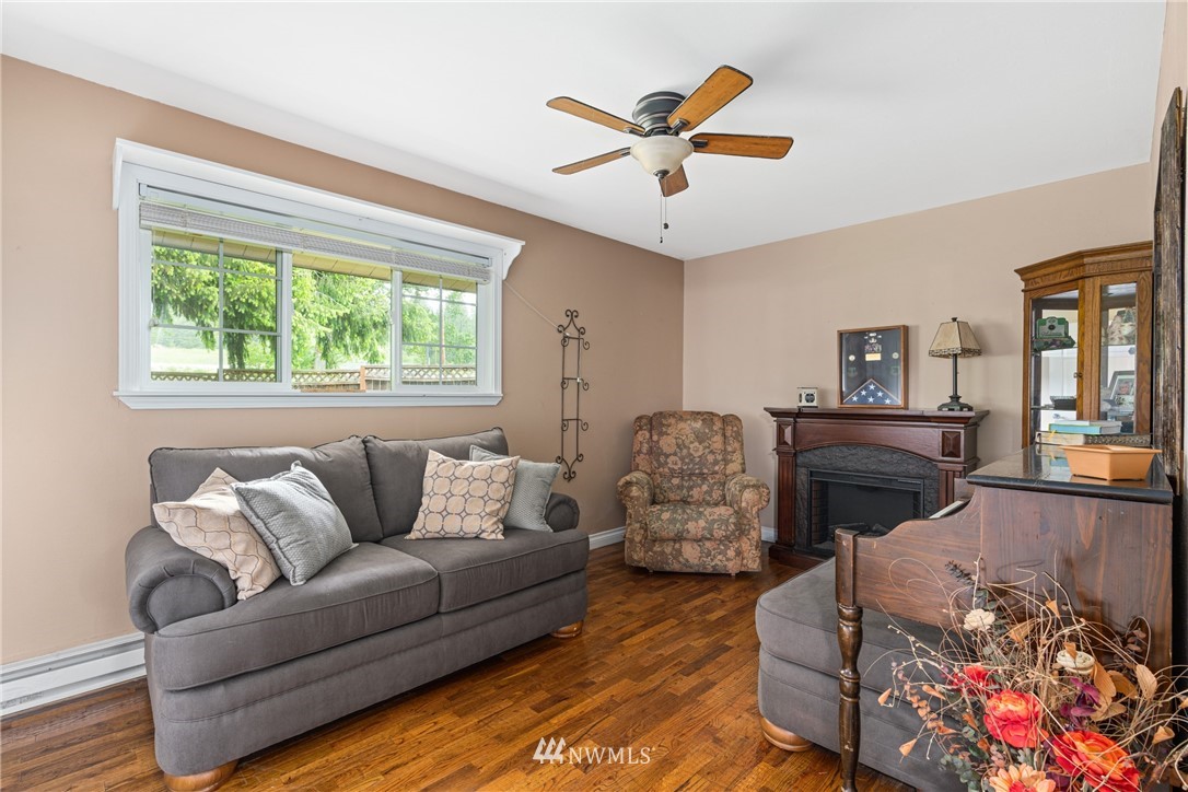 105 Ribelin Road Chehalis, WA 98532 - Photo 14 of 27 a living room with furniture and a large window